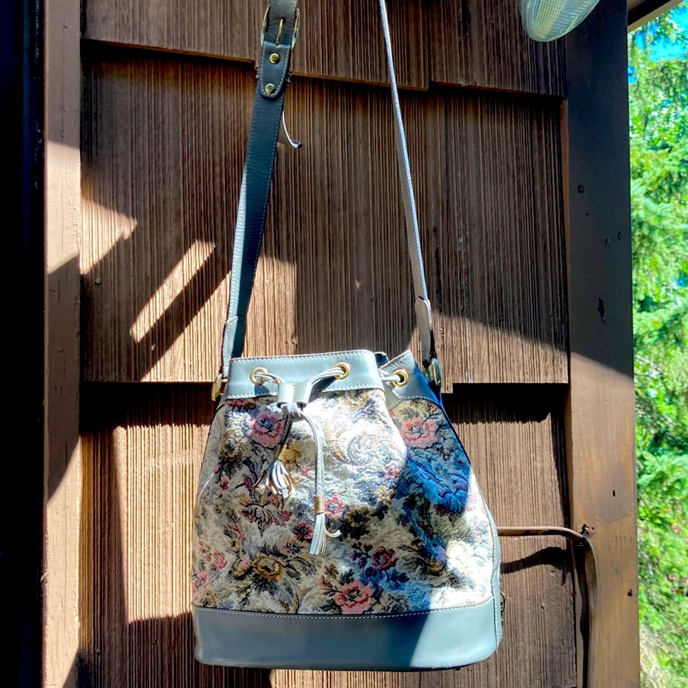Vintage tapestry with leather trim draw strings purse, one of kind, gently love.